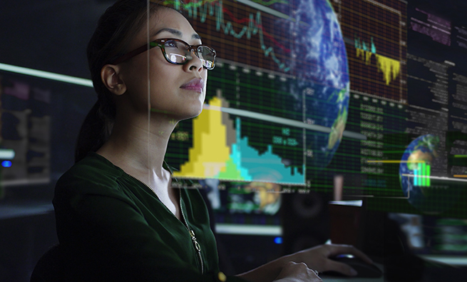Image of a woman working in a futuristic computer