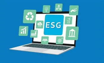 A laptop with the letters ESG on the screen