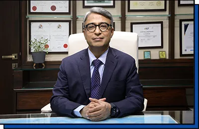 Sunil Deshmukh seated at a desk